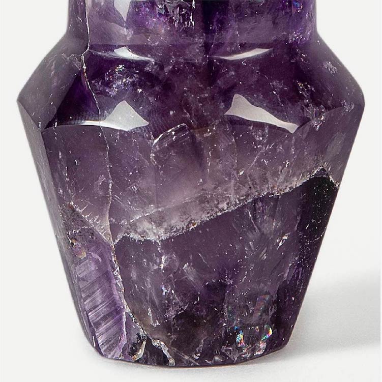 Close detail of natural inclusions and colour variation in the amethyst