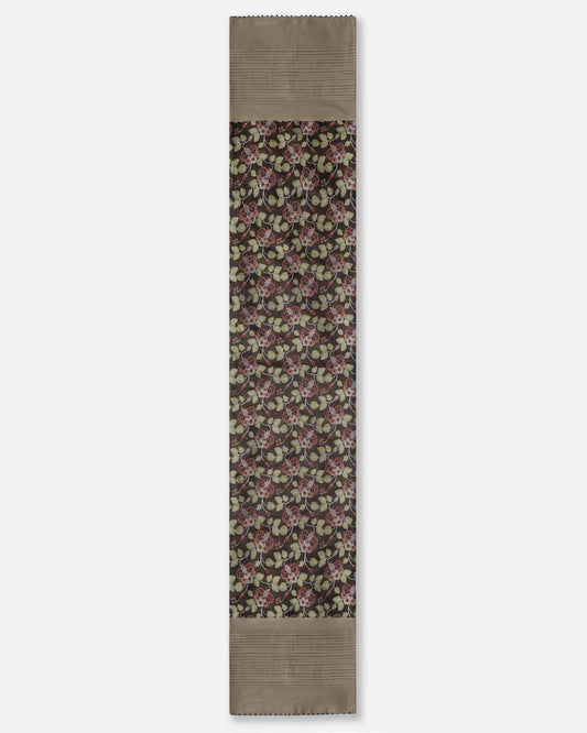 Full length of the black floral Banarasi silk table runner with pintucked border