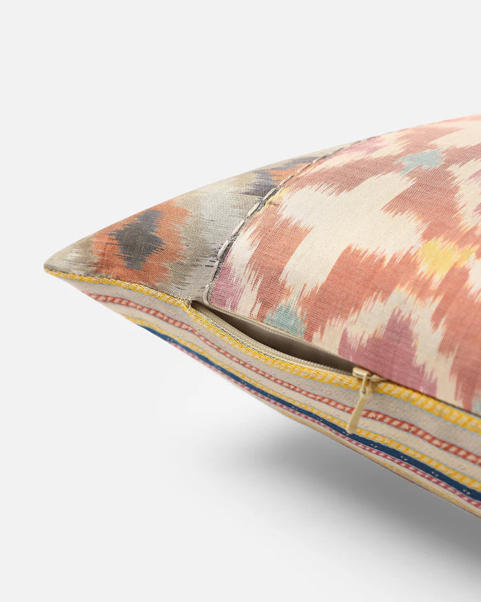 Side view showing the lumbar ikat silk pillow and hidden zip
