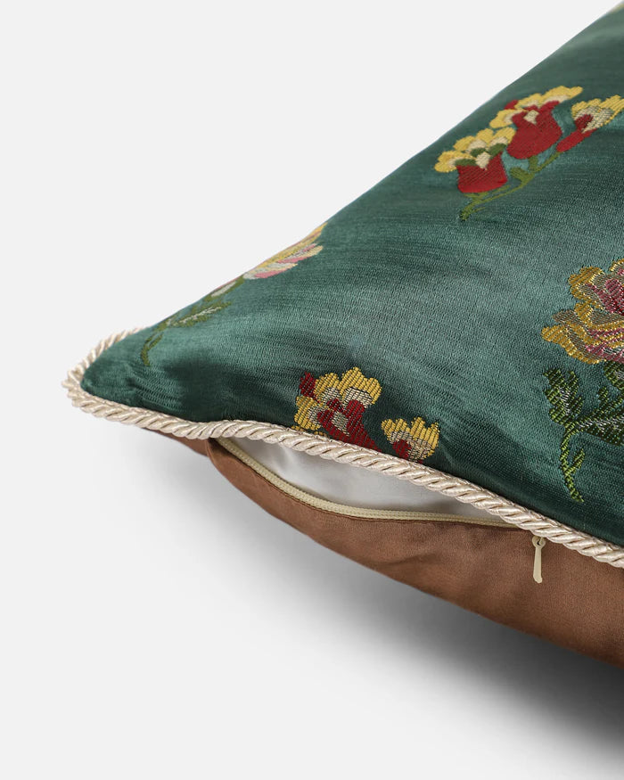 Side view showing emerald front, bronze reverse and hidden zip
