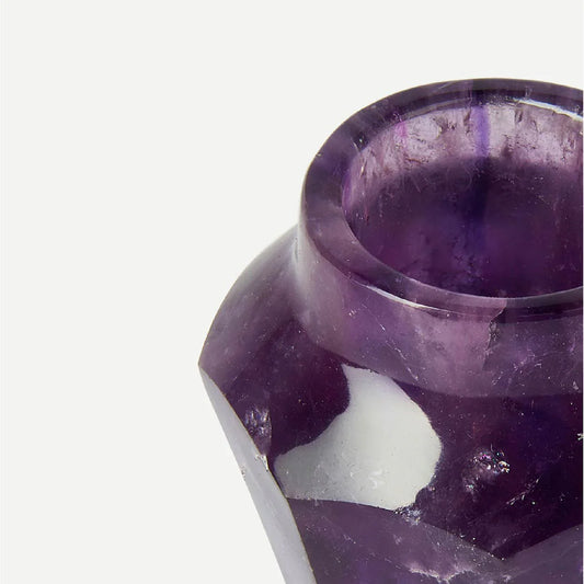Close-up macro detail of natural amethyst quartz veins inside a hand-hollowed Amethystos shot glass, revealing the geological character and Jaipur lapidary craftsmanship of this limited-edition luxury barware gift.