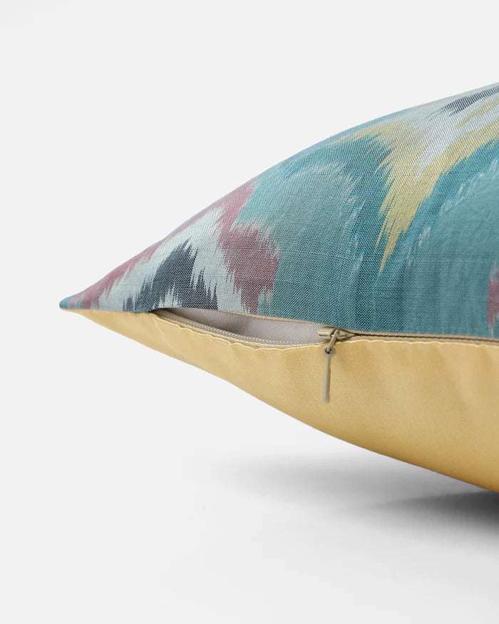 Side view showing aqua front, gold reverse and hidden zip