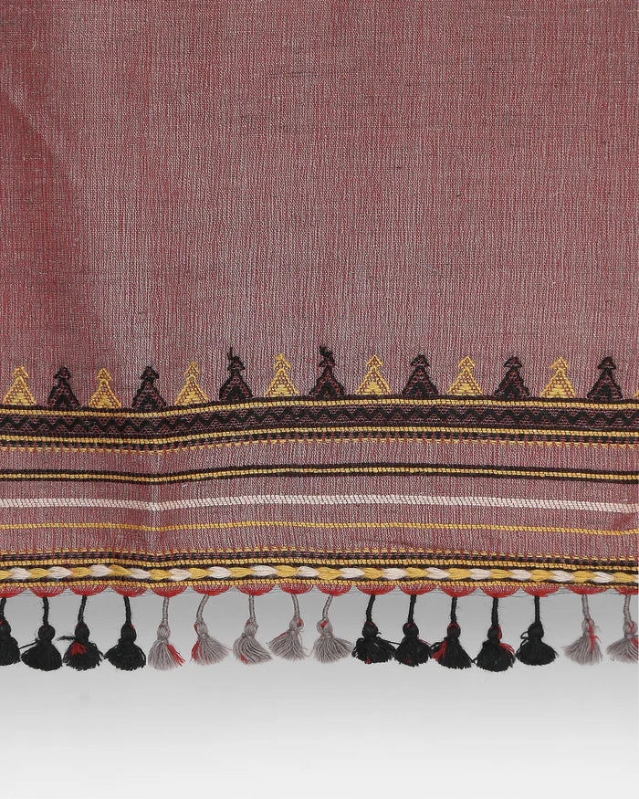 Detail of the woven border and hand-knotted tassel fringe