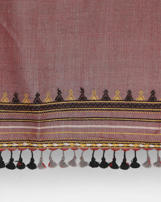 Detail of the woven border and hand-knotted tassel fringe