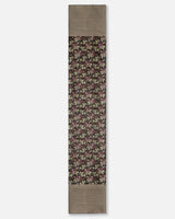 Full length of the black floral Banarasi silk table runner with pintucked border
