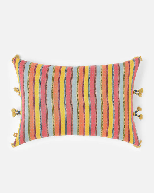 Reverse lumbar pillow in coral with a woven stripe panel