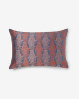 Tanchoi motifs woven into indigo mulberry silk — front of the Anār lumbar pillow