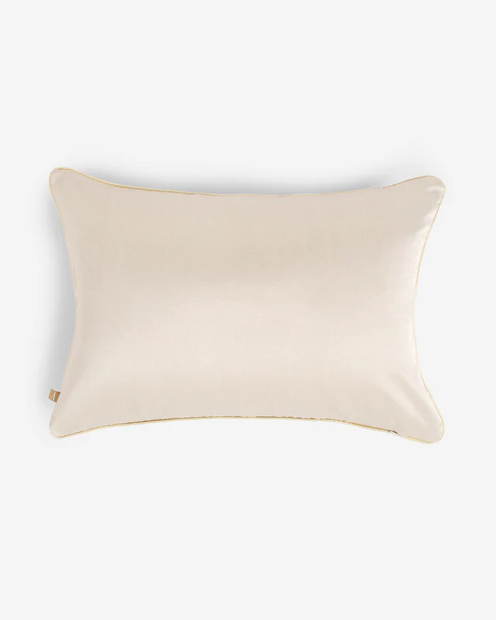Reverse in serene cream silk with piping