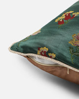 Side view showing emerald front, bronze reverse and hidden zip