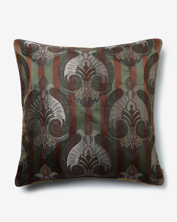 Front — silver ceremonial crests woven into forest-green and umber Gyasar silk