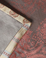 Corner detail of the woven gold-and-cream border on the Tanchoi silk runner