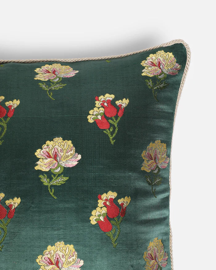 Detail of gold-zari wildflowers woven into the emerald silk, not printed