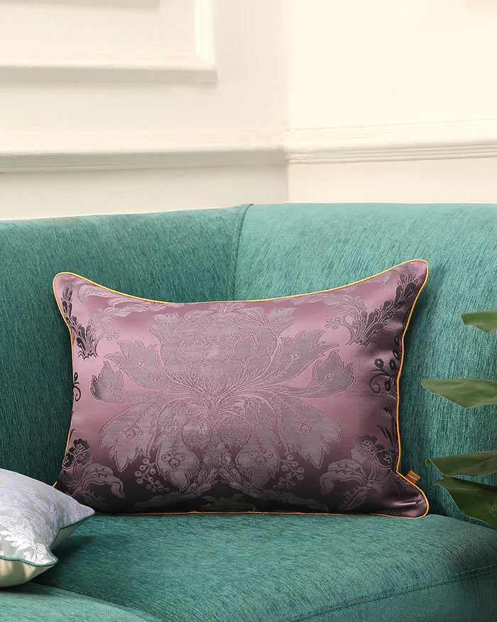 Mauve lilac lumbar pillow styled on a sofa