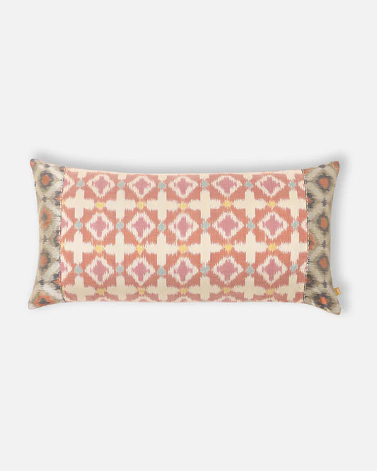 The Loom’s Gambit lumbar pillow featuring hand-loomed Pochampally double ikat in pastel geometric silk.