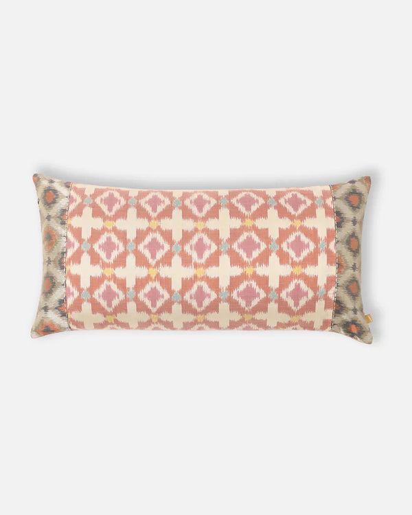 The Loom’s Gambit lumbar pillow featuring hand-loomed Pochampally double ikat in pastel geometric silk.