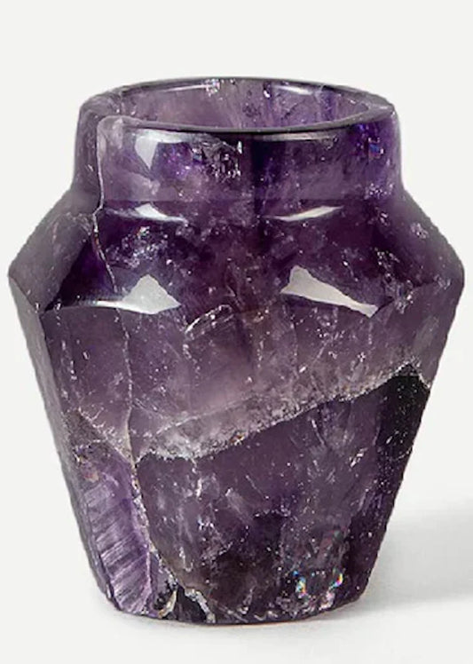 Deep violet amethyst crystal shot glass displayed on a marble surface as a luxury housewarming gift — hand-carved from solid violet quartz, limited edition, by Home & the World.