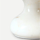 The turned pedestal base, hand-carved from solid Makrana marble