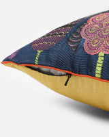 Close-up of midnight-blue silk texture and hidden zip closure