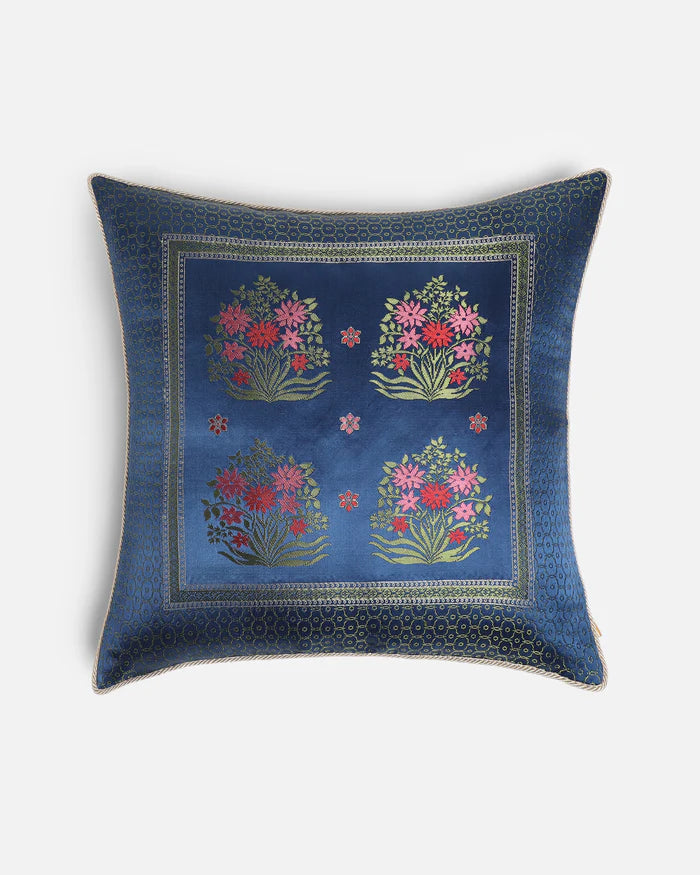 Front — four floral charbagh-garden quadrants woven into deep navy Gyasar silk