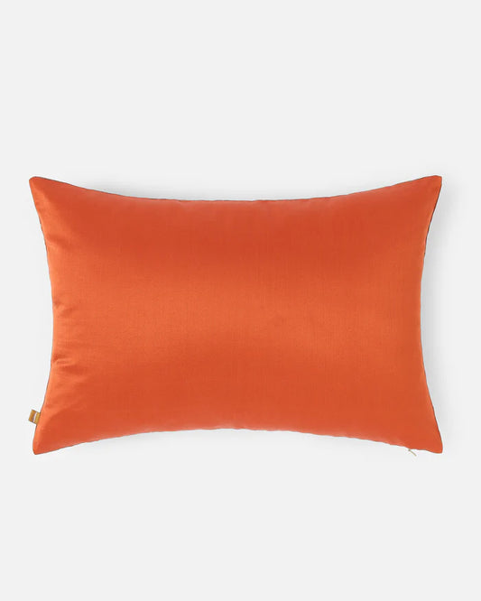 Reverse of lumbar pillow in solid orange silk