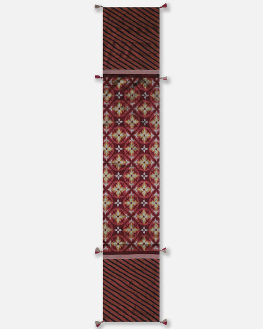 Full length of the oxblood-and-black Pochampally ikat silk runner