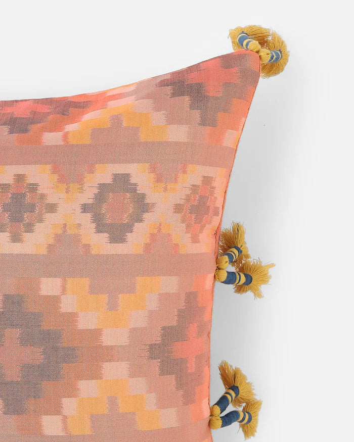 Close detail of the feathered Pochampally ikat stripe of lumbar pillow, dyed before weaving