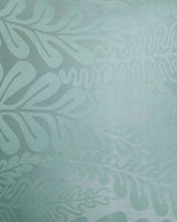 Close detail of the tonal fern woven into the seafoam silk, not printed.
