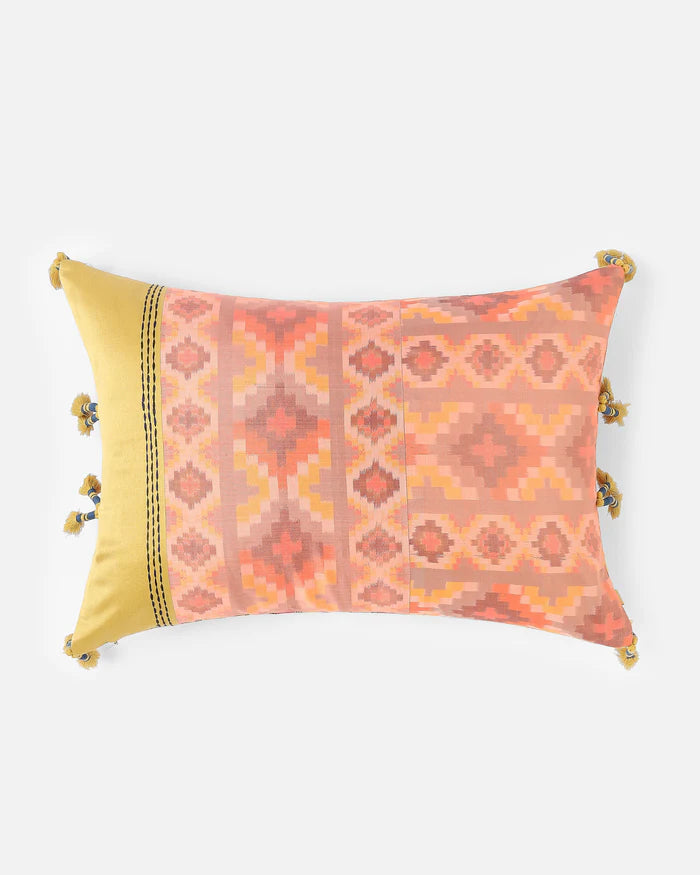 Front — coral and saffron lumbar pillow in Pochampally ikat silk with corner tassels