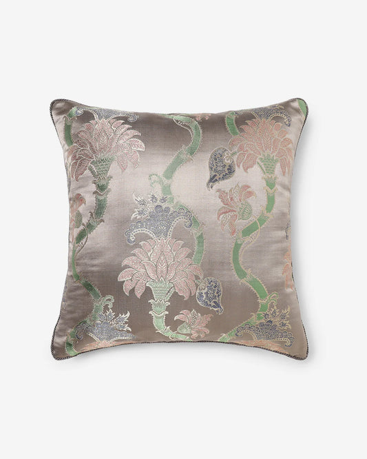 Front view of the taupe Gyasar silk pillow featuring handwoven floral scrolls and vine patterns in sage and rose.