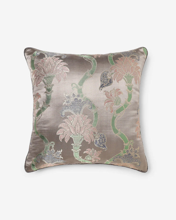 Front view of the taupe Gyasar silk pillow featuring handwoven floral scrolls and vine patterns in sage and rose.
